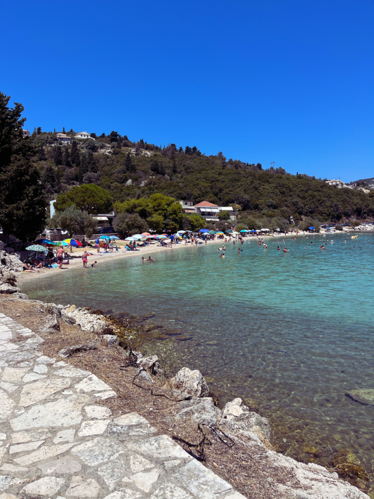 a lot of people and umbrellas on epikopis beach Lefkada