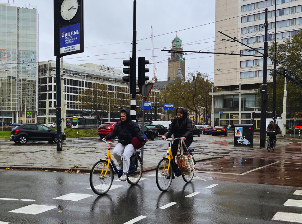 cyclists in the rain in Rotterdam city center