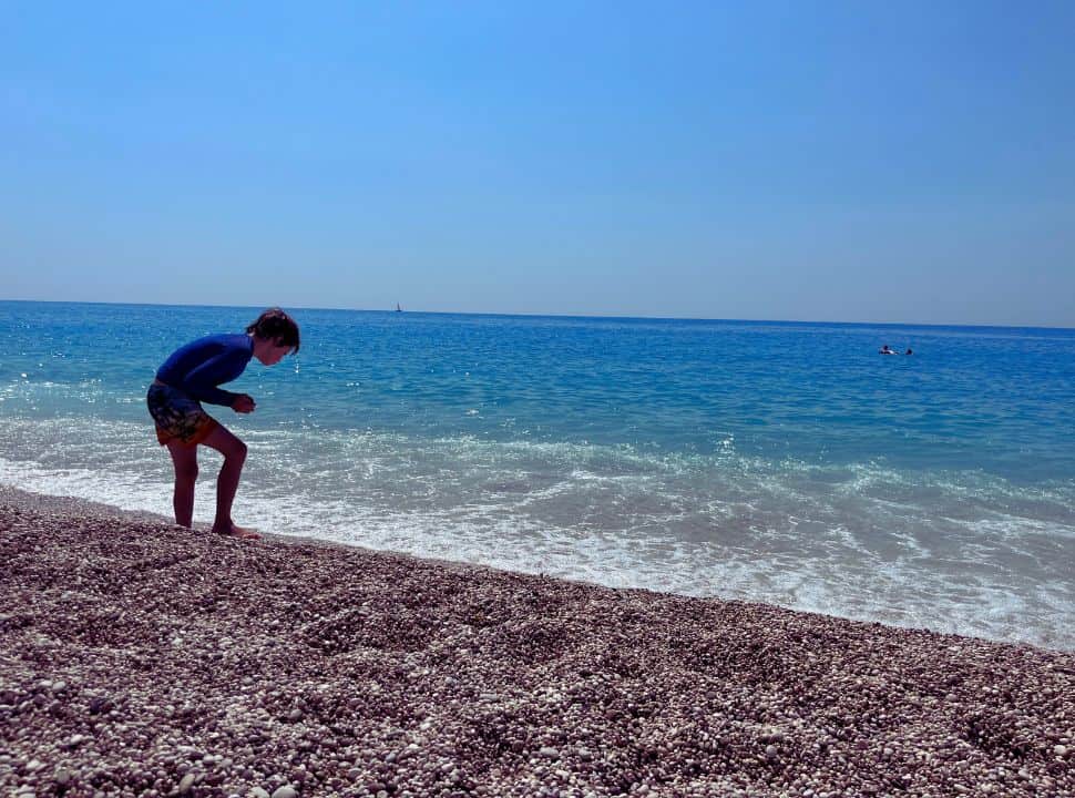 searching for stones at milos beach