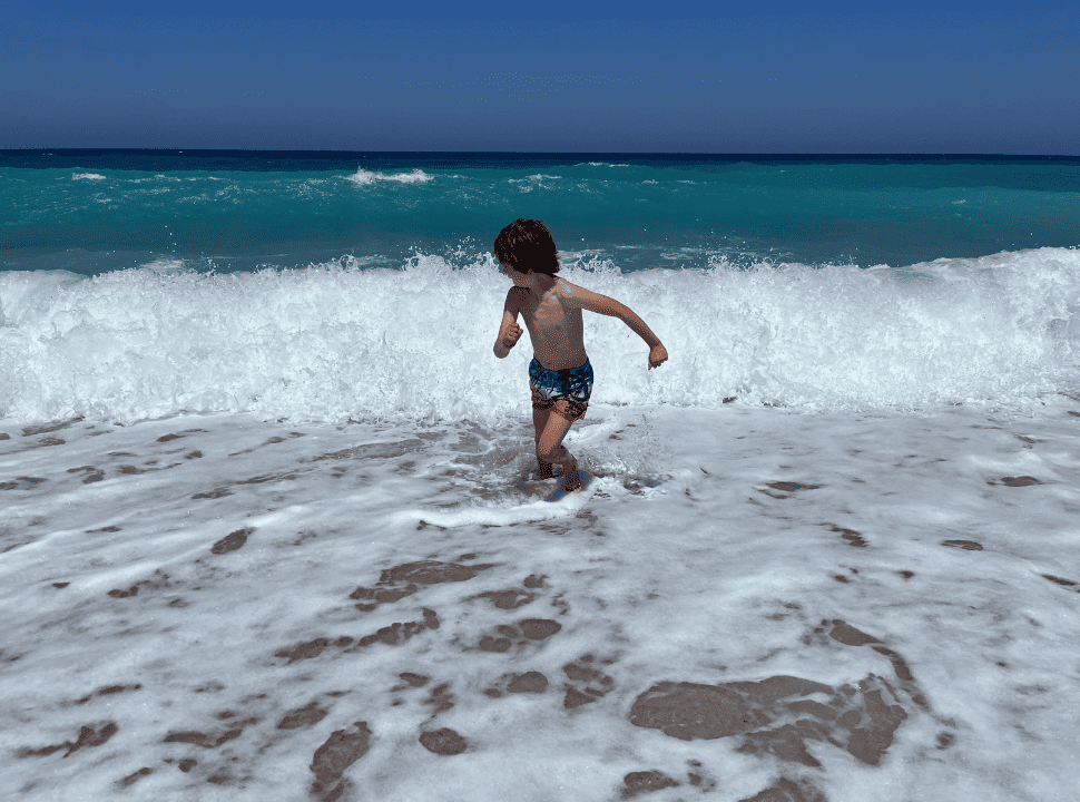 running away from a huge waves at the north of lefkada
