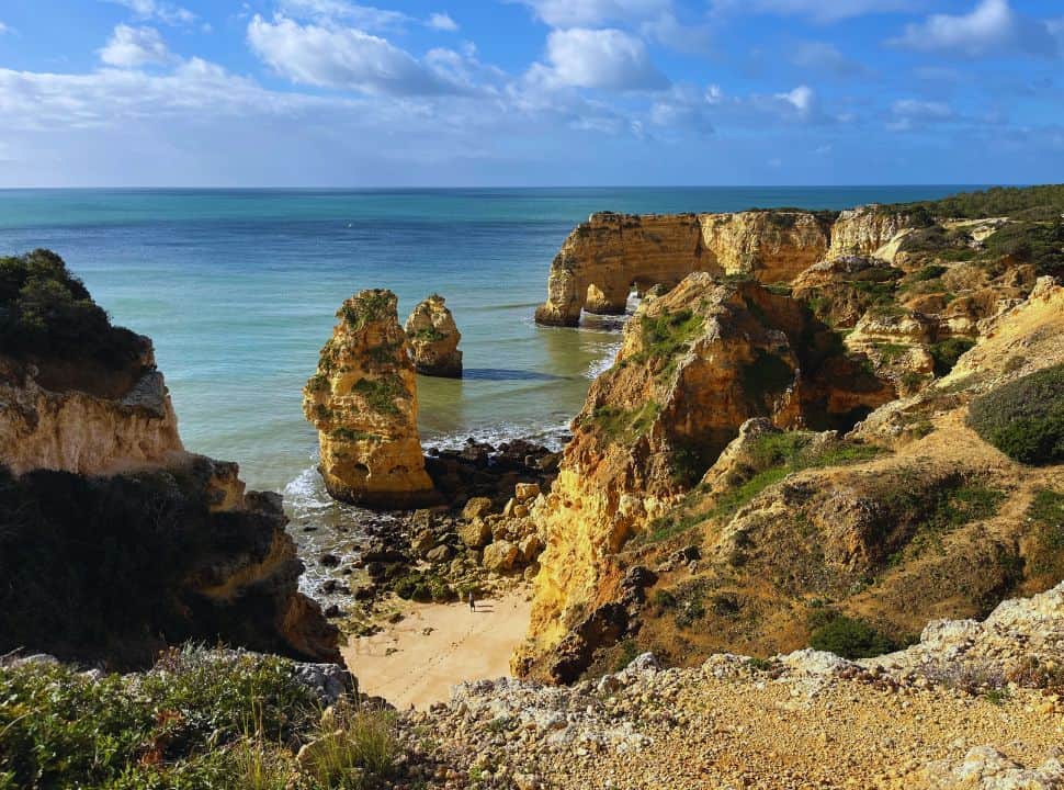 view of rock formations at praia da marinha beach the algarve portugal