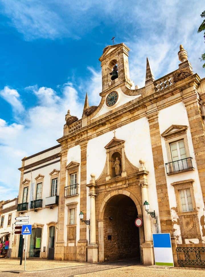 a archway leading to the old part of faro town, portugal