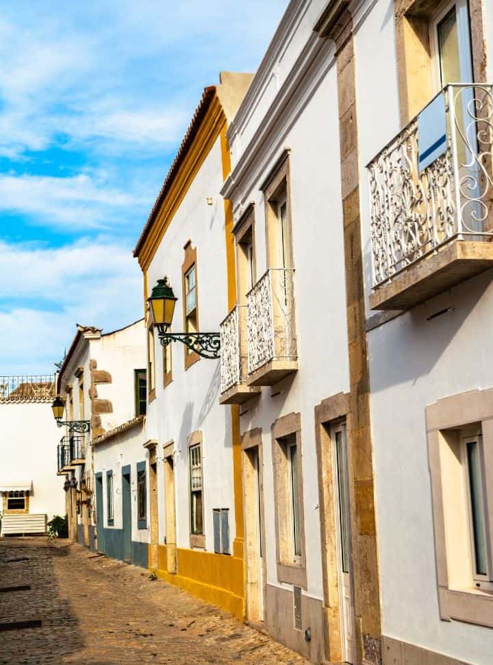 street with beautiful houses in faro portugal