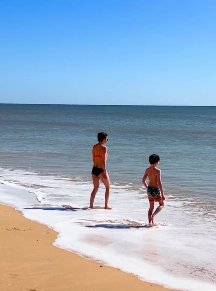 going into the water at praia da falesia the algarve portugal