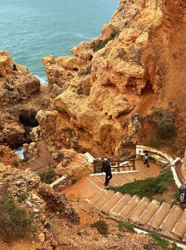 stairs leading us to the rock pools at algar seco carvoeiro highlight 