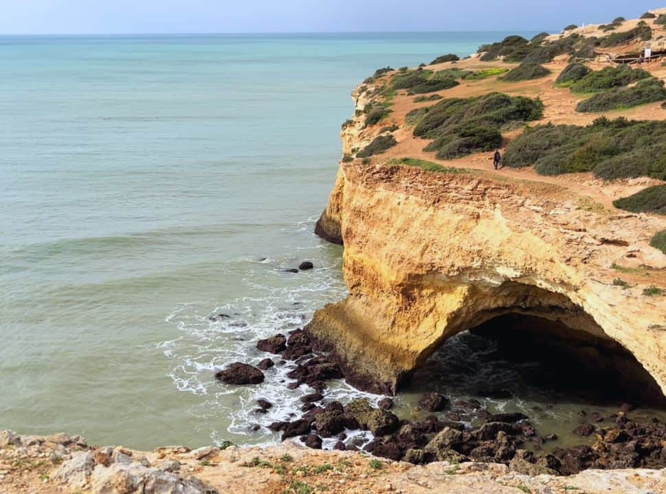 walking along the cliff edge at the 7 hanging valleys hike portugal