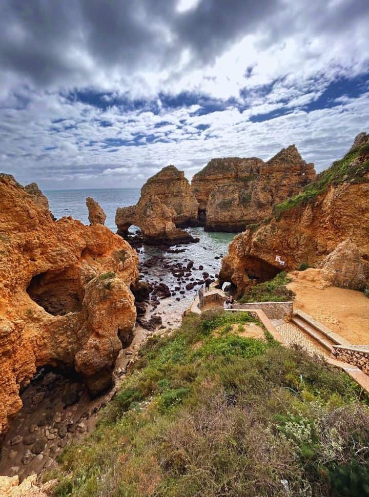 stairs leading to the rock formations of the ponta da piedade lagos