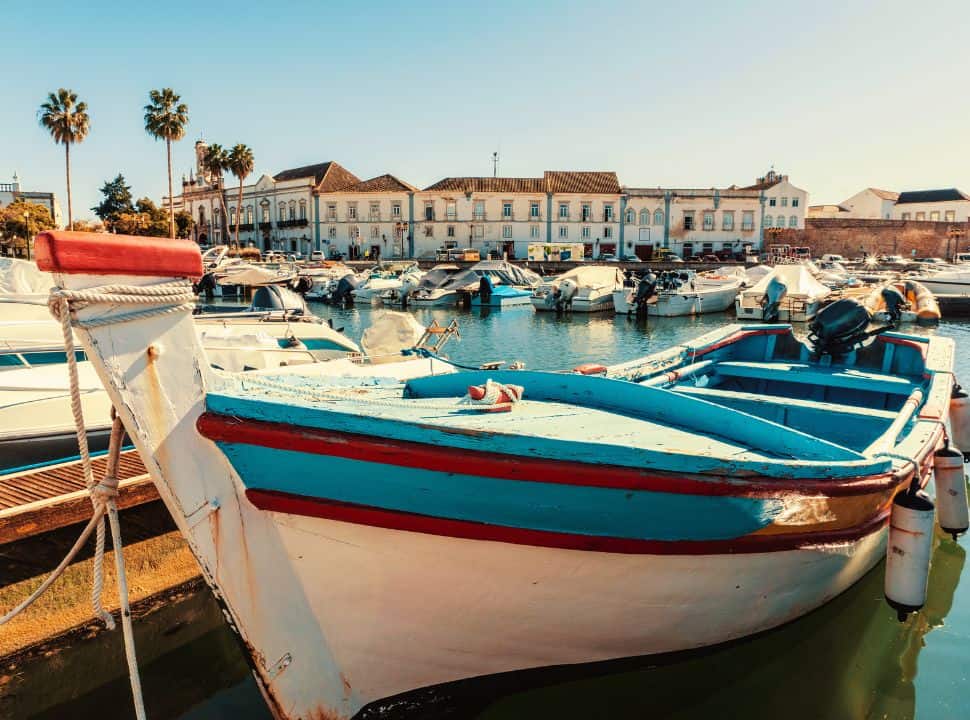 boats in the harbour of faro portugal