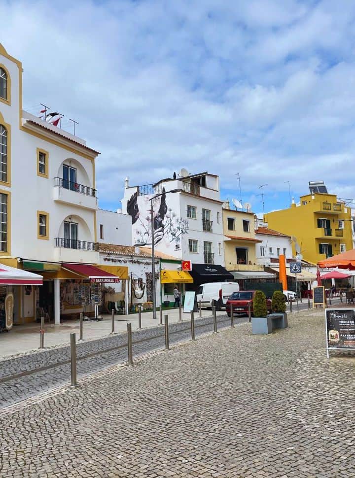 one of the main streets in the town of Carvoeiro Portugal