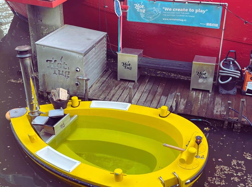 a yellow hot tub for tours through Rotterdam by boat. 