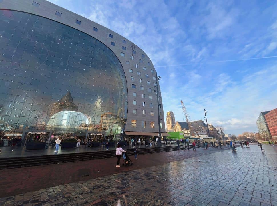 blaak square in Rotterdam with view of the markthal and st. laurens church