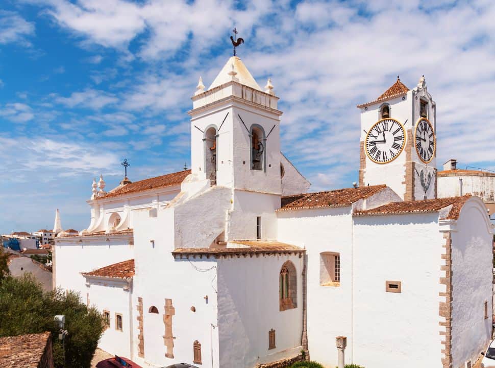bright white Santa Maria Church in Tavira Portugal