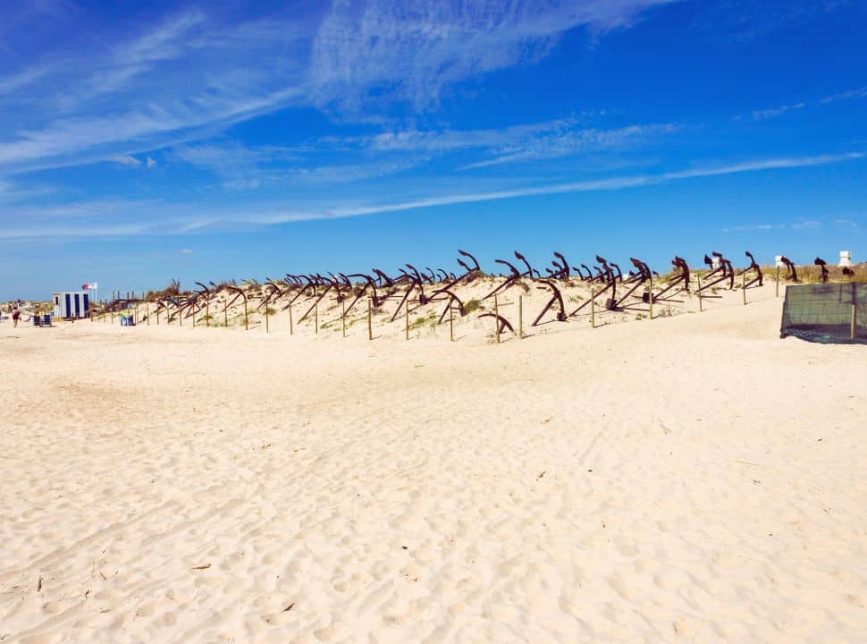 barril beach with the famous anchors in the sand near Tavira beach
