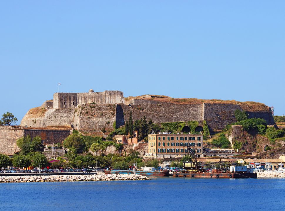 view of the fortress and its heavy walls from the water