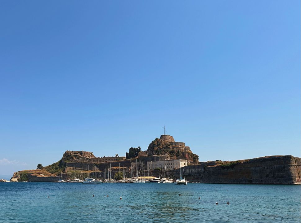 the old fortress with an impressive wall, surrounded by water where now sailboats dock