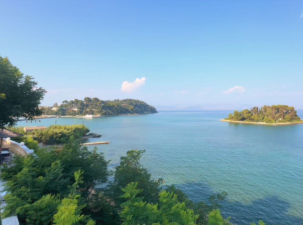 view of mouse island on the right and kanoni village on the pensinsula on the right