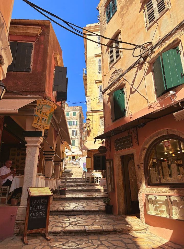 narrow stairs leading you pass shops and restaurants in corfu town