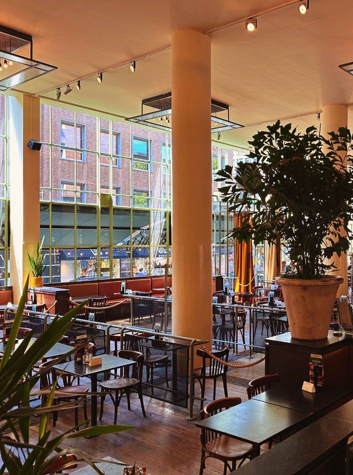 the interior of the dudok restaurant. the big windows make it bright and welcoming