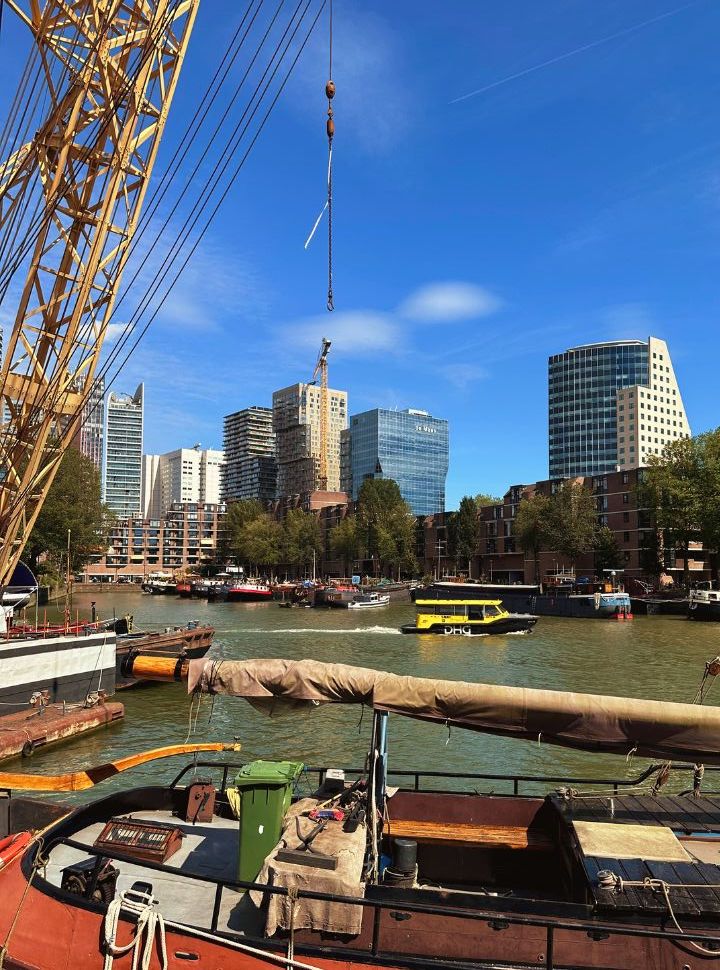 water taxi rotterdam navigating through the old harbour of Rotterdam