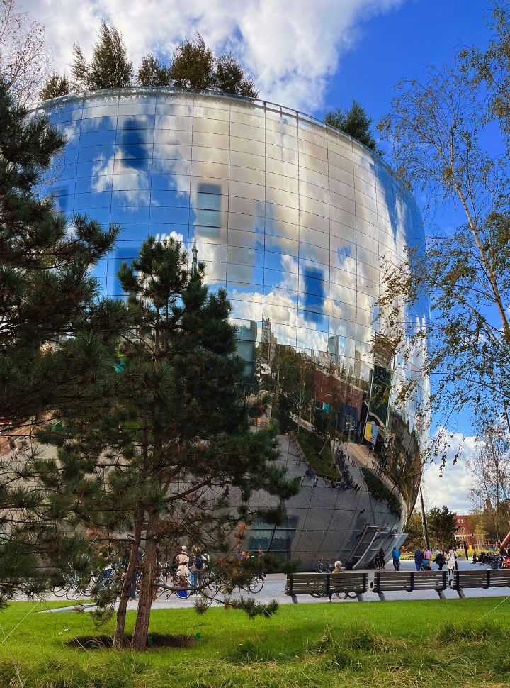 the depot building in Rotterdam has a glass facade so you can see its surroundings 