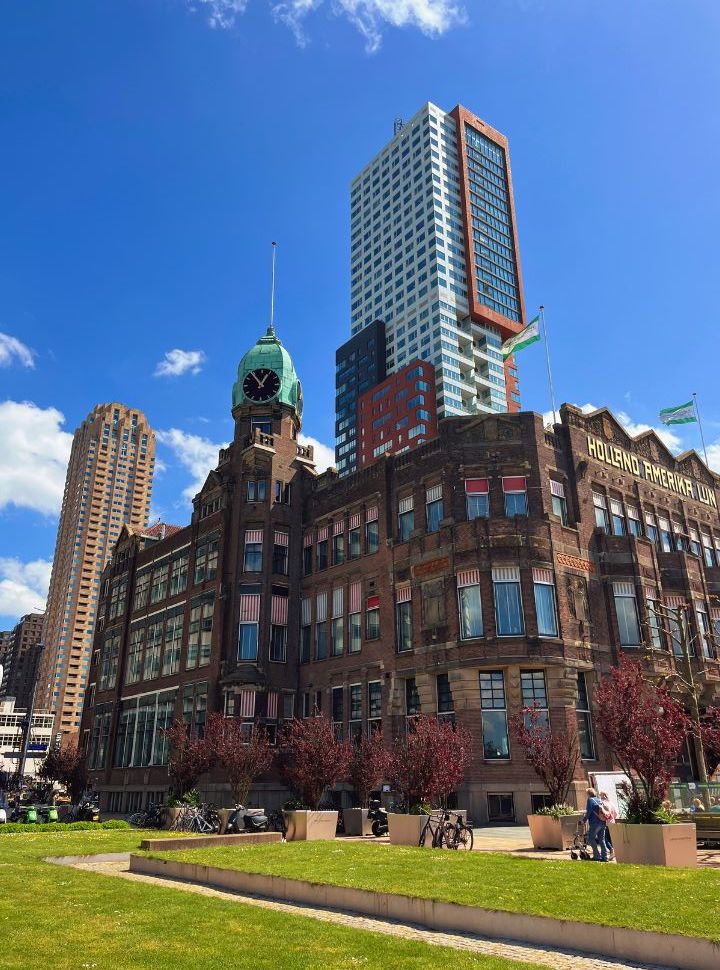 the old historic Hotel New York with the Montevideo offices in the back at the Wilhelminakade in Rotterdam