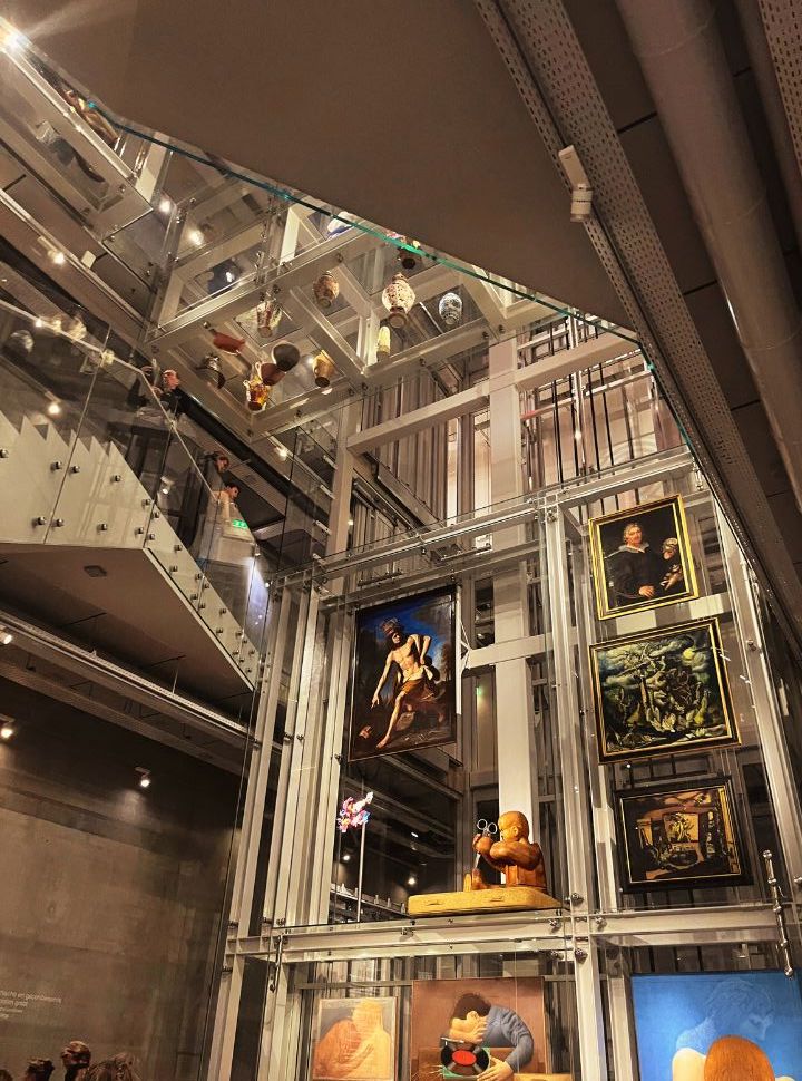 paintings, sculpture and vases displayed at the museum along the staircase in the depot Rotterdam