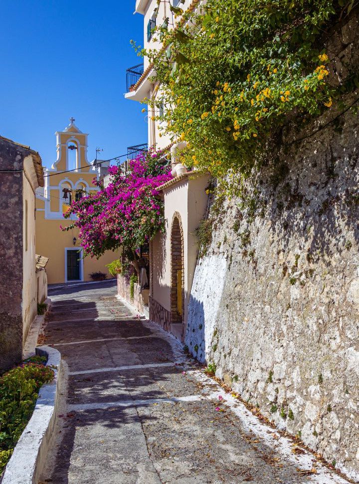 beautiful narrow street leading to a church