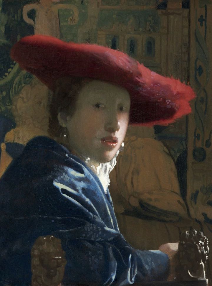 vermeer painting of a girl wearing a red hat