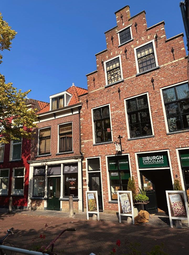 old dutch building with a old styled facade, now a shop