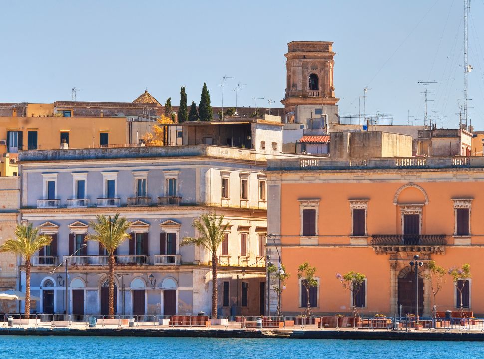 view of old buildings of brindisi from accross the river