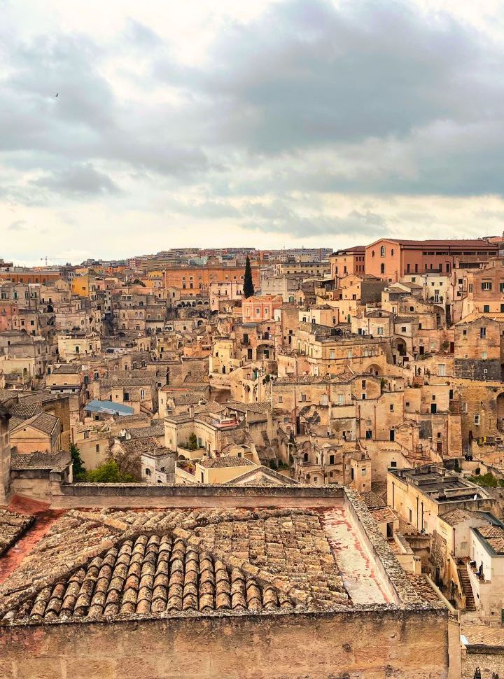 view of matera with its stone houses, stairs and narrow streets