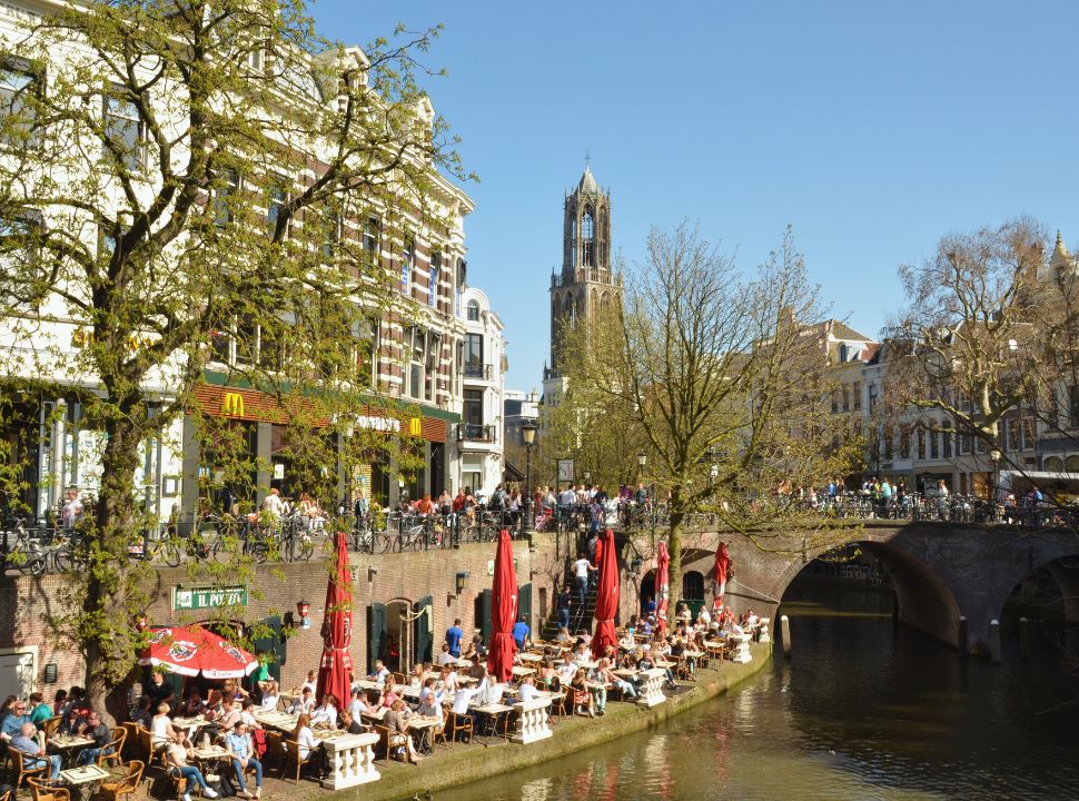 outdoor terraces set along the canal located in the heart of utrecht city in the netherlands