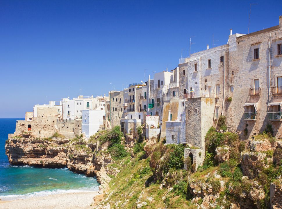 stunning architecture of buildings built on the cliffs at Polignano a Mare