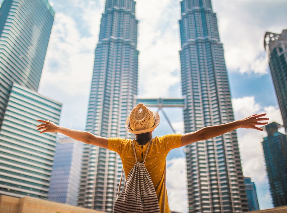 solo female traveller at the Petronas Towers in Kuala Lumpur