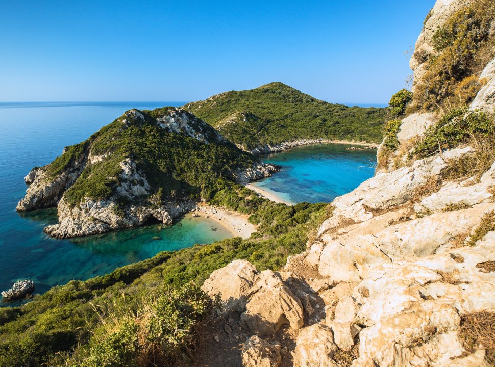 View of porto timoni beach from above, known for its double beach with emerald green water in west corfu