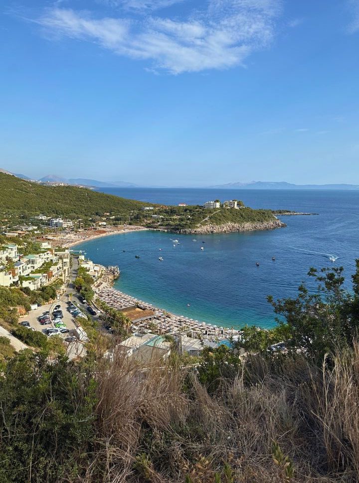 view of a Jala beach from above, full with sunbeds and lines with accommodation