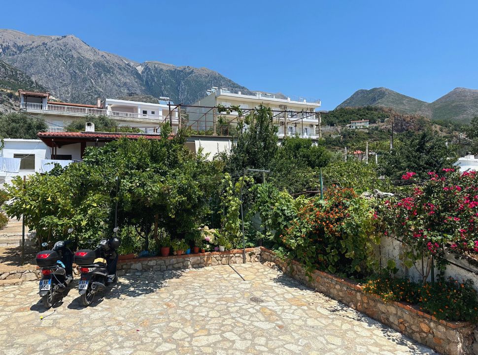 two motorscooters parked at an accommodation in Dhermi beach Albania