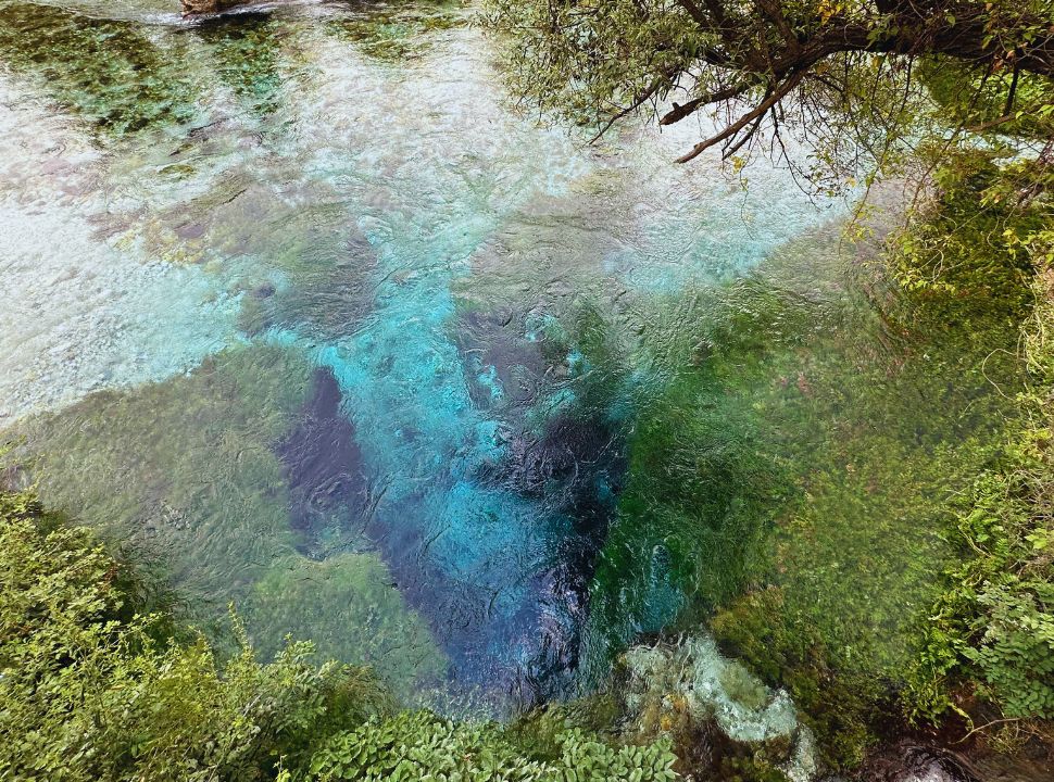 the various shades of blue of a natural spring in albania