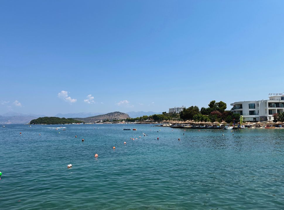 view over the water with beach clubs along the water front