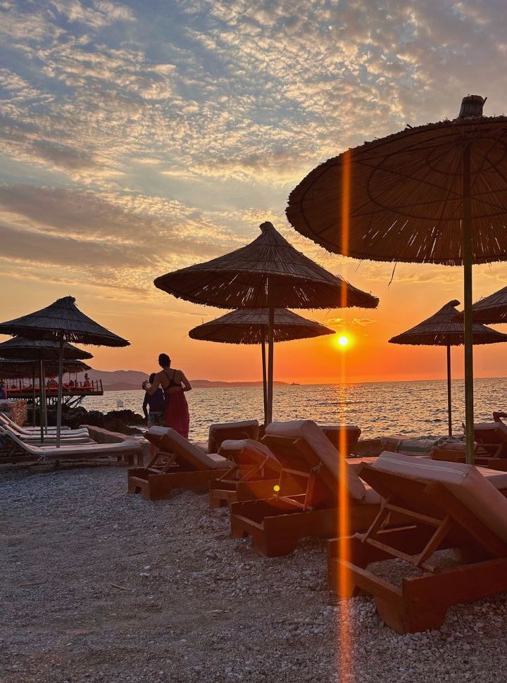 mother and son enjoying the sun set at Ksamil Albania