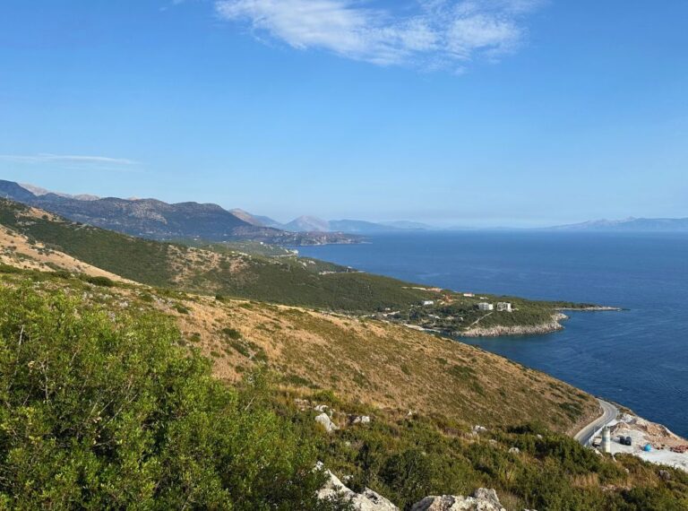 view of albanian riviera with mountains and blue ocean water