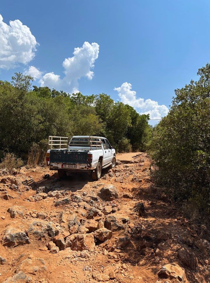 four by four car tackling the rocky road to Gjipe Beach, one of the most popular beaches in Albania