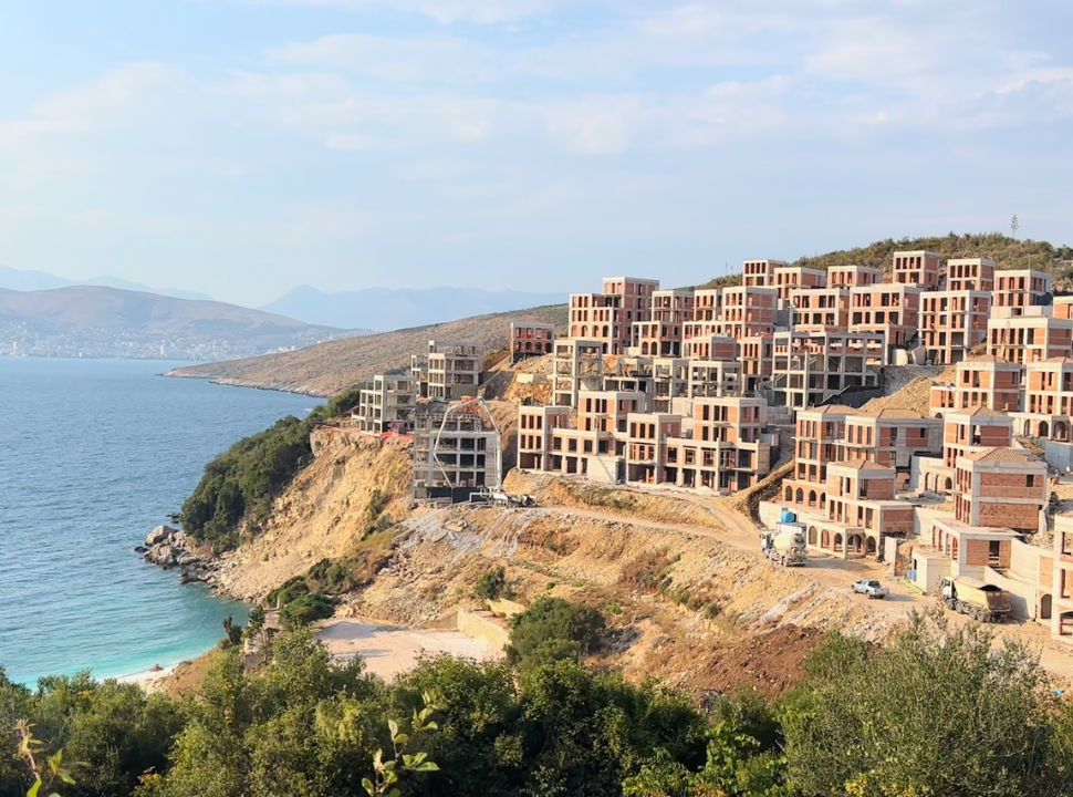 resort being constructed at a bay with a small beach between Saranda and Ksamil Albania