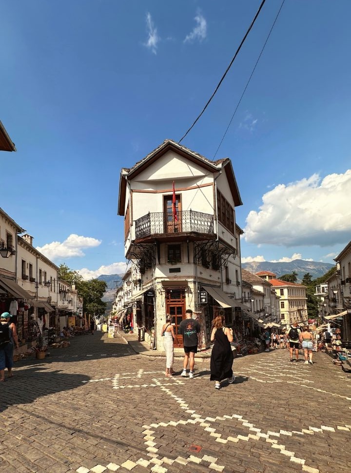 a beautiful old house standing right in the middle of two streets of the old bazaar in Gjirokaster Albania