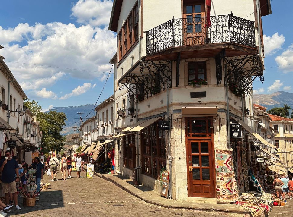 beautiful 3 story house on the end of two streets with shops selling rugs at the old bazaar in Gjirokaster