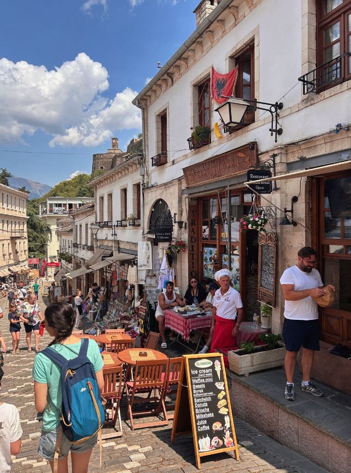 busy in one of the small old bazaar streets in Gjirokaster Albania