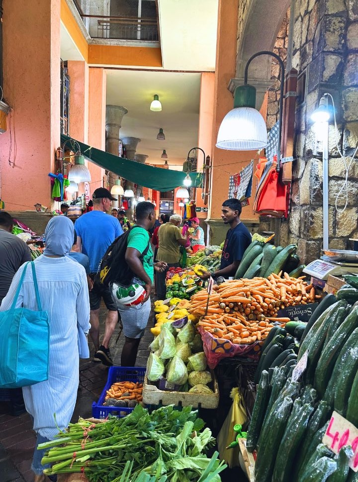 people shopping at the vegetable and fruit market in Port Louis Mauritius