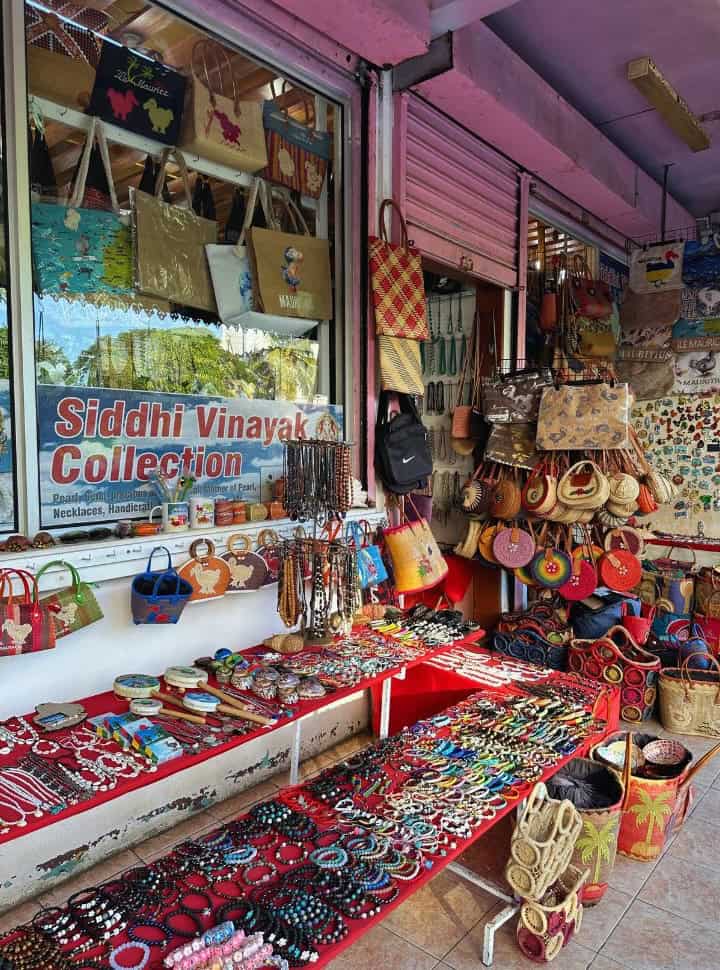 bracelets, necklaces and bags displayed outside a souvenir shop in Grand Baie Mauritius, mauritius travel tips shopping
