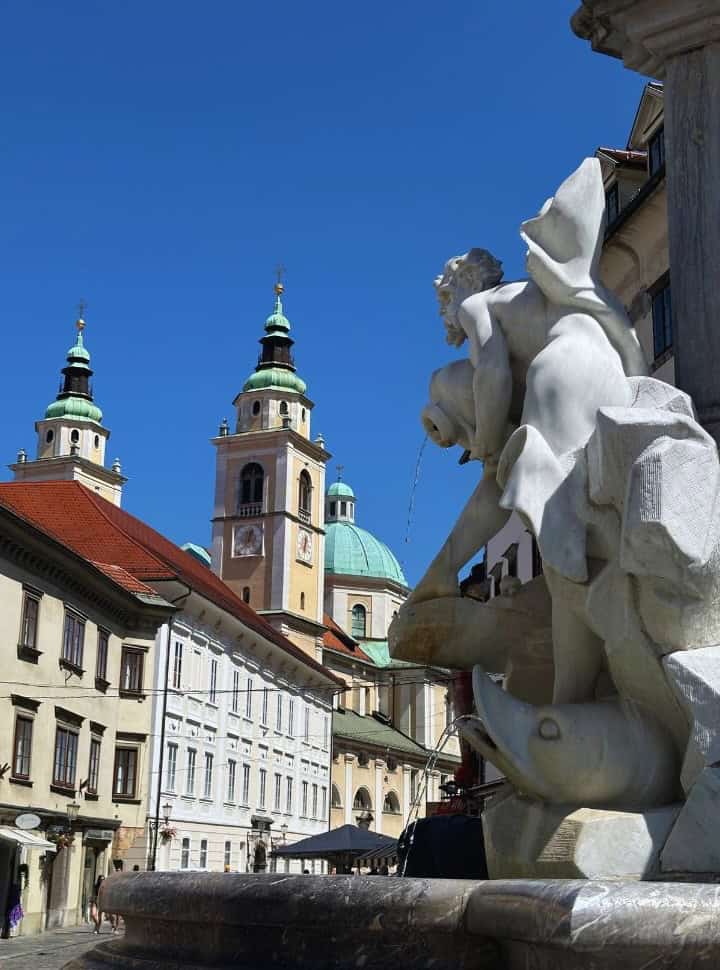square with statue and fountain in Ljubljana Slovenia