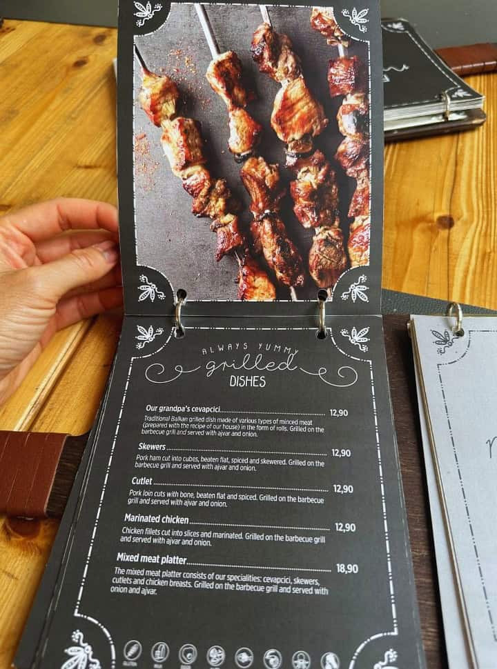 a menu of a restaurant in Slovenia serving all kinds of grilled dishes 